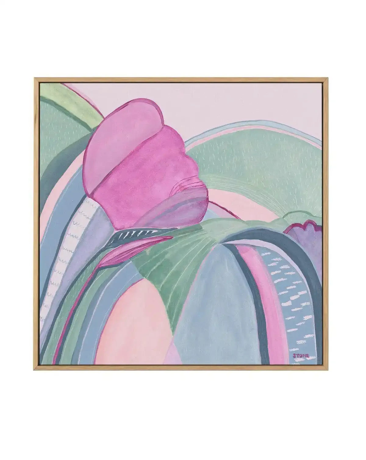 Abstract canvas print featuring a large, stylized pink flower with layered petals in shades of fuchsia, magenta, and pale pink, set against a backdrop of rolling hills in muted sage green, pale blue, and soft lavender. The composition has a painterly quality with visible brushstrokes and a gentle, flowing feel, displayed in a natural oak frame.