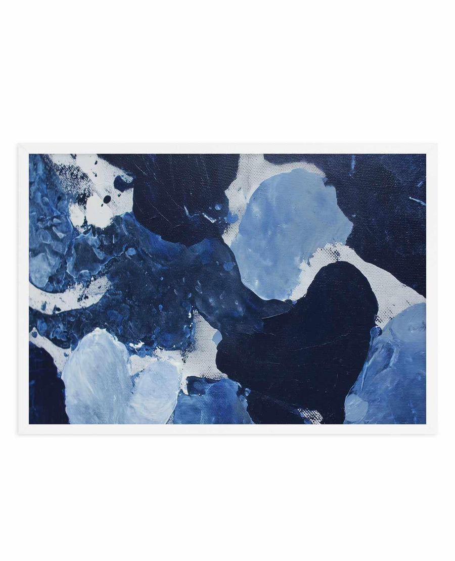 Abstract art print titled "Midnight Current II" featuring swirling compositions of deep navy blue, black, and white paint strokes. The artwork displays organic, fluid forms suggesting water movement or currents, with lighter blue-grey tones creating contrast against darker areas. The canvas texture is visible with visible brushwork and paint application throughout. The print is mounted in a white frame with white border, presented against a plain background.