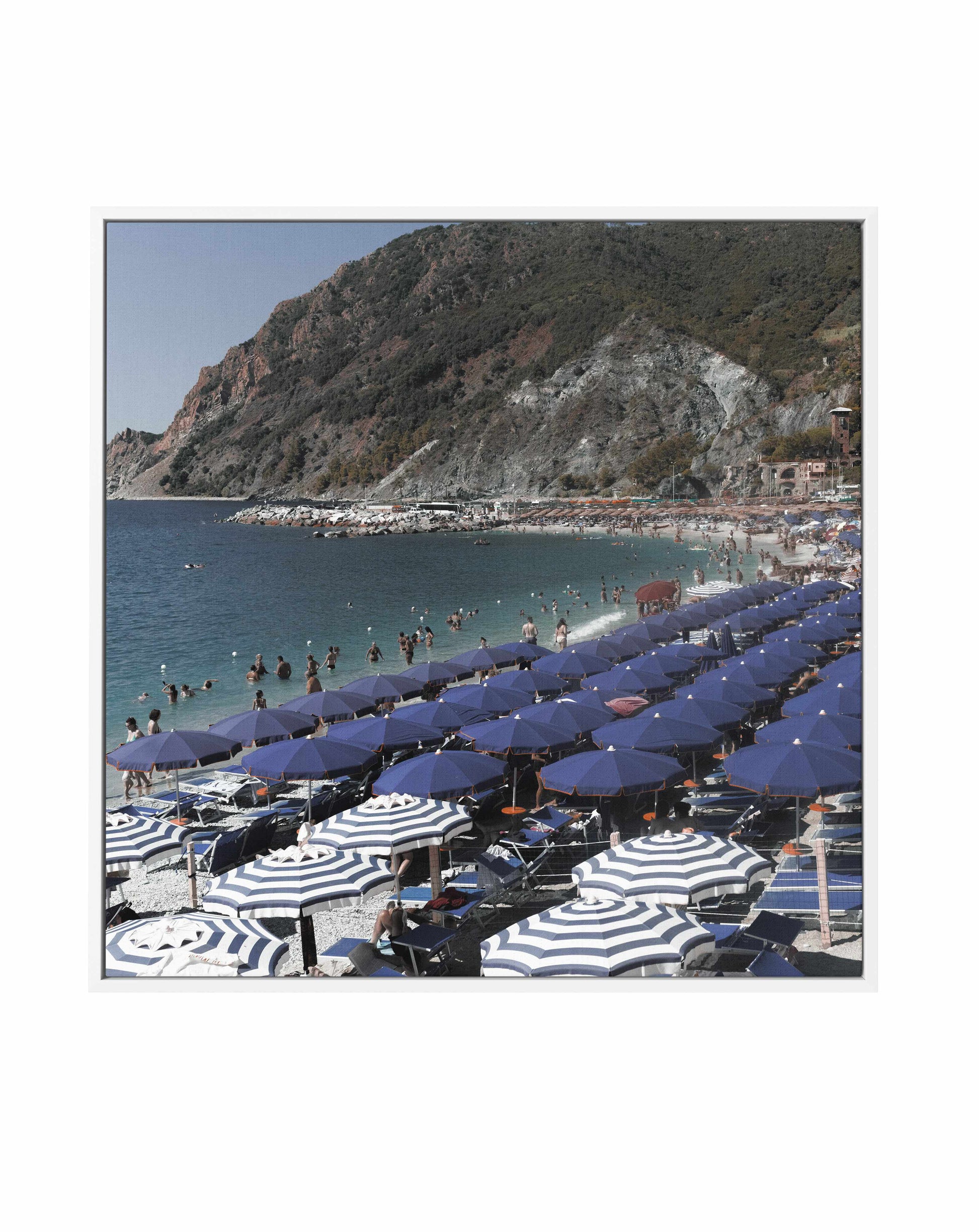 Monterosso Blue Umbrellas | Framed Canvas Art Print from Olive et Oriel where you can shop wallpaper and artworks online