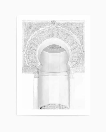 Moroccan arch art print featuring a detailed white archway with intricate carved patterns and calligraphy on a white background, printed on fine art paper with a matte finish.