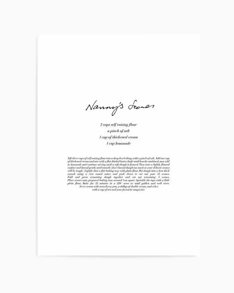 Art print featuring a handwritten recipe for "Nanny's Scones" in black script on a white background. The recipe lists ingredients: "3 cups self raising flour, a pinch of salt, 1 cup of thickened cream, 1 cup lemonade" and detailed instructions for making and serving the scones. The text has a delicate, personal quality.