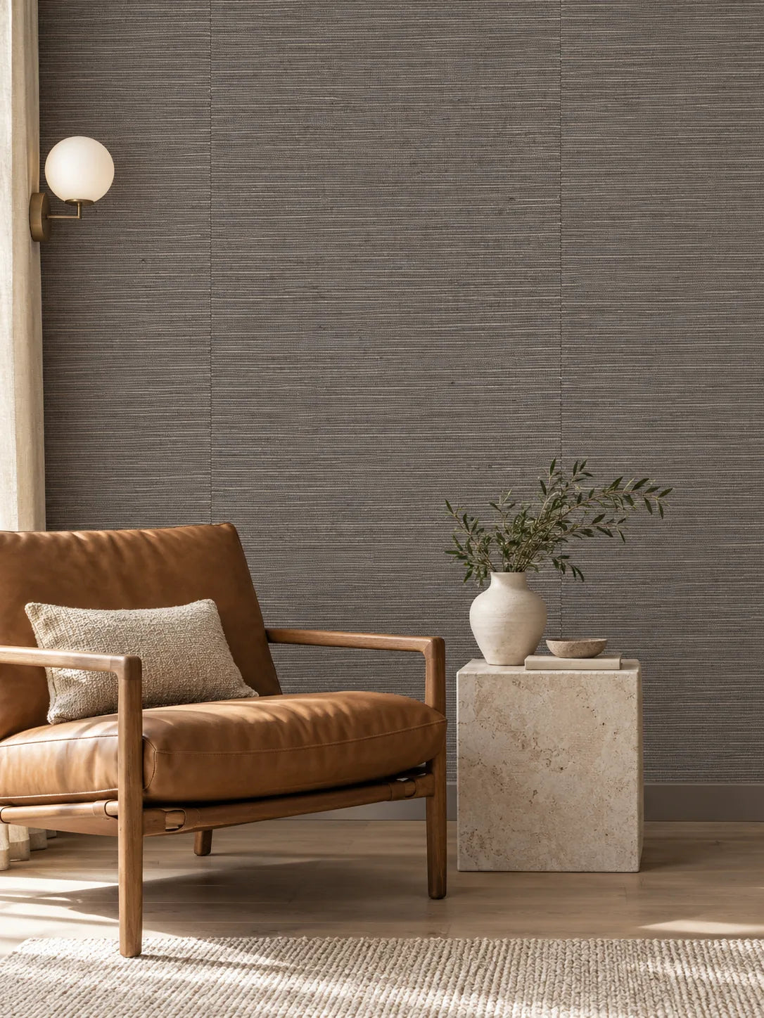 Dark Taupe Grey Linear Abaca Wallpaper — styled stone and leather salon visualisation of tone and texture, with subtle flush wallpaper joins