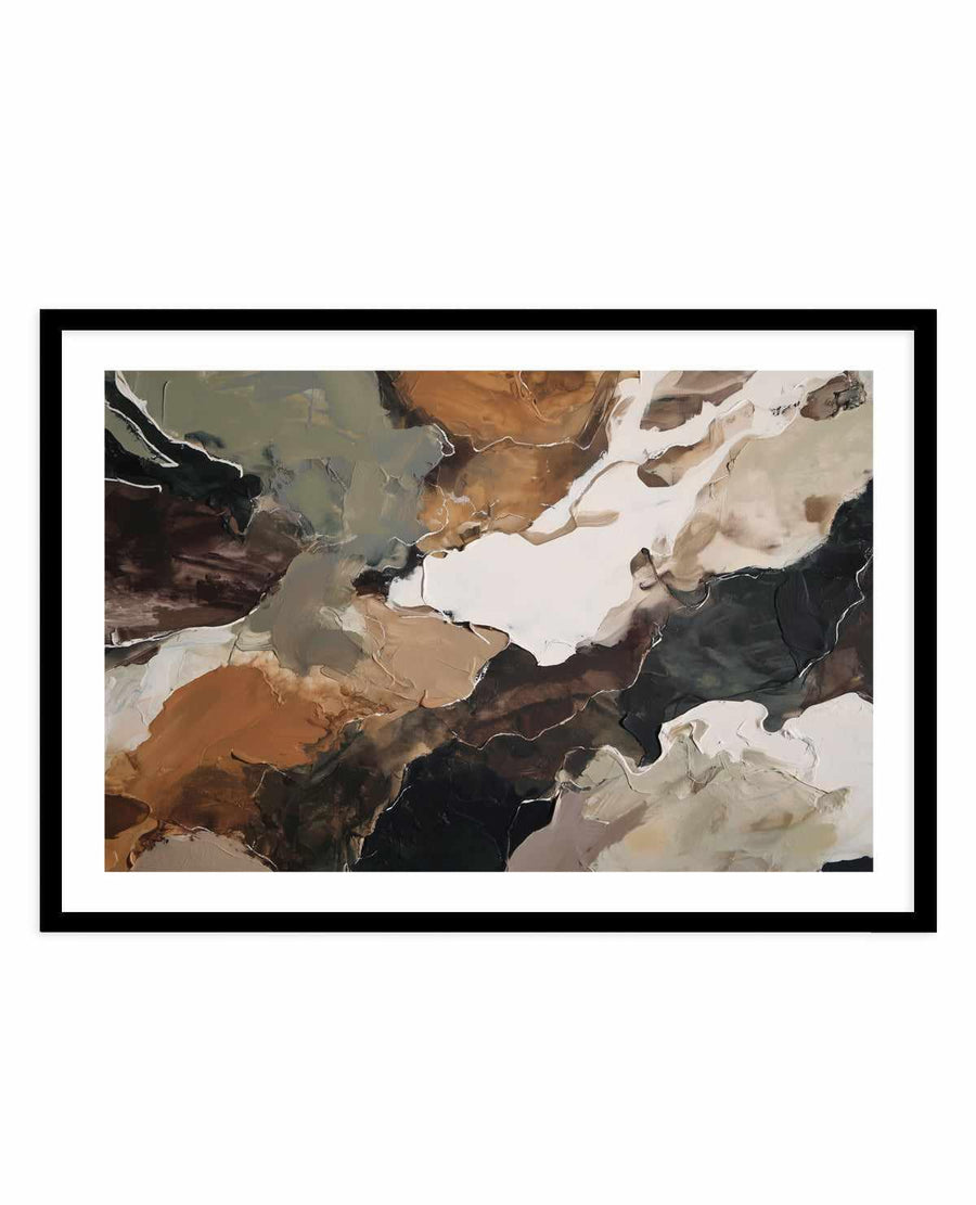 Abstract art print titled Ochre Ridge I displayed in a black frame with white border. The composition features flowing, organic shapes in warm ochre, burnt orange, and golden tones contrasted against deep charcoal black, soft cream, and pale grey areas. The painting has a fluid, watercolor-like quality with translucent layers and soft edges that suggest a landscape or aerial perspective. Colors blend and bleed into one another creating a sense of movement and depth across the horizontal composition.