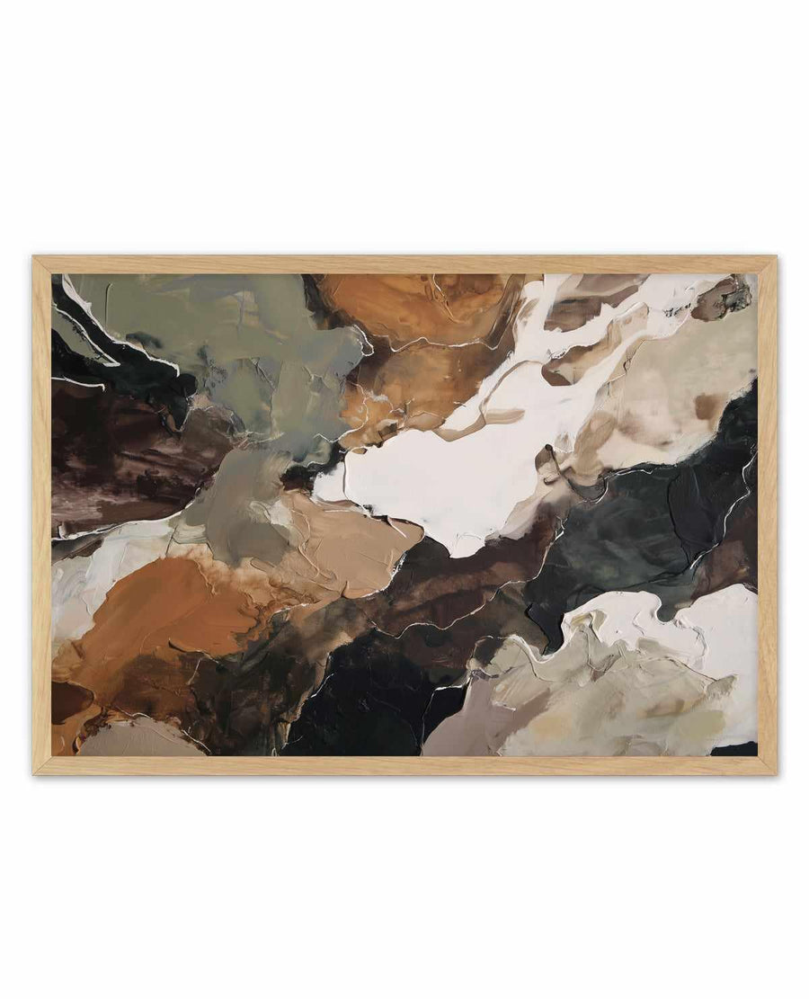 Abstract art print titled "Ochre Ridge I" displayed in a natural wood frame. The composition features organic, flowing shapes in warm ochre, burnt orange, and earthy tan tones blending with cool greens, grays, and deep charcoal blacks. White and cream-colored negative space creates contrast throughout. The watercolor-style painting has soft, diffused edges and atmospheric qualities, suggesting a landscape or topographical forms. The framed print is shown against a white background.