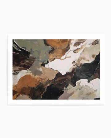 Abstract art print titled Ochre Ridge I featuring flowing, organic shapes in earthy tones of burnt orange, warm ochre, deep charcoal black, and cream white. The composition uses loose, gestural brushstrokes reminiscent of watercolor or ink wash, with colors bleeding and layering to create depth. The painting has an aerial or landscape-inspired quality with undulating forms suggesting ridges or terrain. The artwork is mounted in a white frame with white border, displayed against a neutral background.