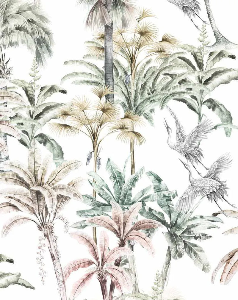 Peel and stick wallpaper featuring a repeating pattern of hand-painted tropical palm trees and cranes on a white background. The design includes tall palm trees with light green and beige fronds, shorter banana-like plants with broad green leaves, and two white cranes with outstretched wings in the lower right. The botanical design has a loose, organic watercolour quality with visible brushstroke texture.