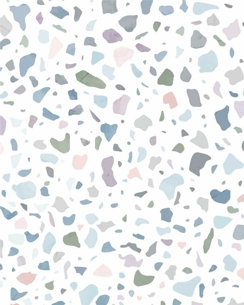 Peel and stick wallpaper featuring a repeating pattern of irregular terrazzo-style chips in a palette of soft pastel colours including muted blues, sage greens, dusty pinks, and pale purples, scattered across a clean white background. The design has a smooth, flat graphic quality.