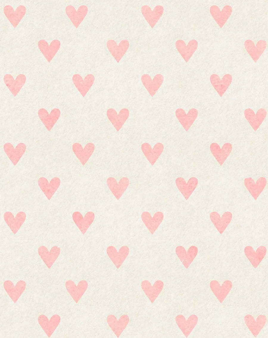 Peel and stick wallpaper featuring a repeating pattern of hand-painted blush pink hearts on a textured, off-white background. The hearts are evenly spaced in a grid, creating a soft, romantic, and playful design with a subtle watercolour texture.