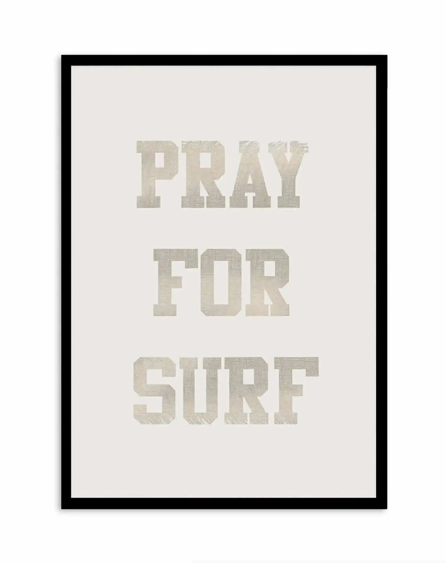 Art print featuring the words "PRAY FOR SURF" in three lines of large, distressed, collegiate-style block letters in a light, textured grey on a plain off-white background, displayed in a black frame with a white border.