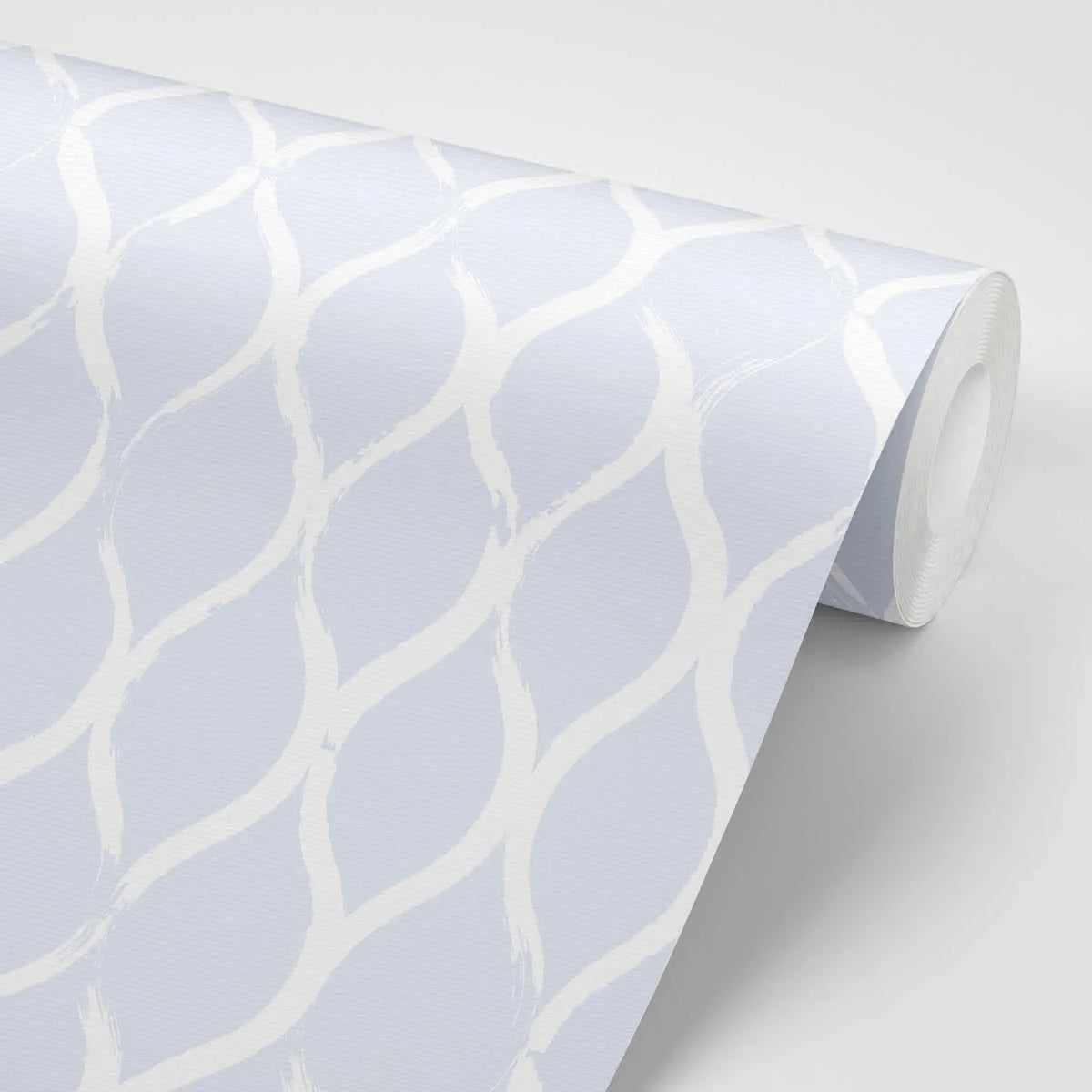 Peel and stick wallpaper featuring a repeating pattern of hand-painted wavy lines in off-white on a pale periwinkle blue background. The design has a loose, organic quality with visible brushstroke texture, creating a ripple or wave-like effect.