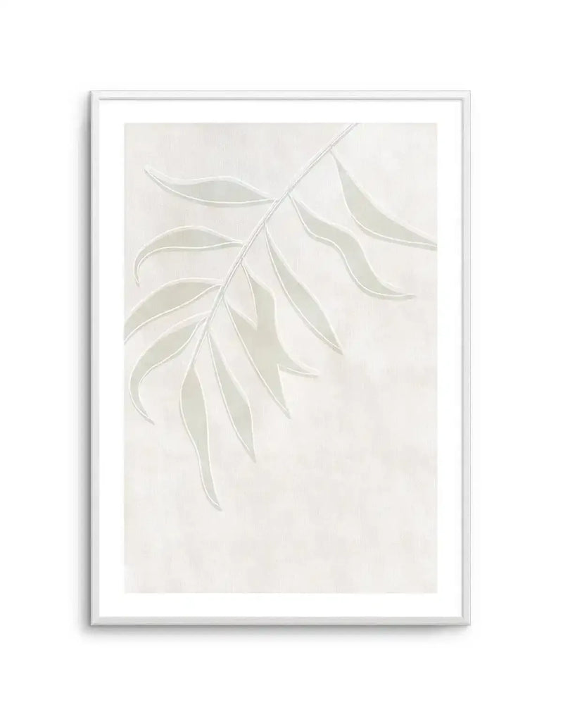 Botanical art print featuring a single palm frond with multiple leaves in a soft sage green, outlined in white, against a textured cream background, displayed in a white frame with white border.