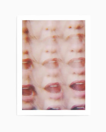 Abstract:
Abstract art print featuring a blurred, multi-layered composition of a person's face, primarily focusing on the nose and mouth, repeated and overlaid to create a sense of motion and distortion. The colour palette is soft and muted, with flesh tones, pale pinks, and hints of red on the lips, giving it a dreamlike or unsettling quality. Printed on fine art paper with a matte finish.