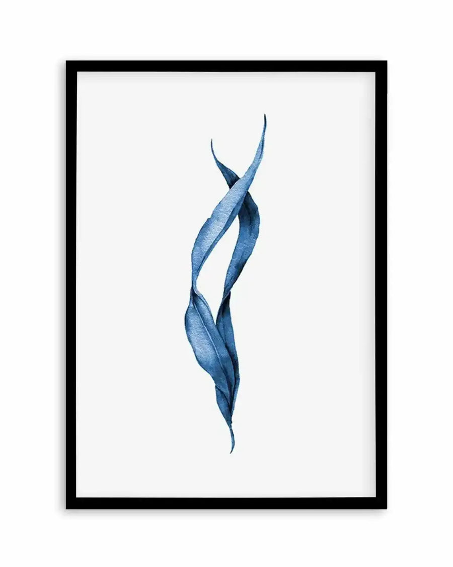 Watercolour art print featuring two intertwined, elongated leaves in a deep, vibrant blue, creating a graceful, flowing vertical composition on a stark white background, displayed in a black frame with a white border.