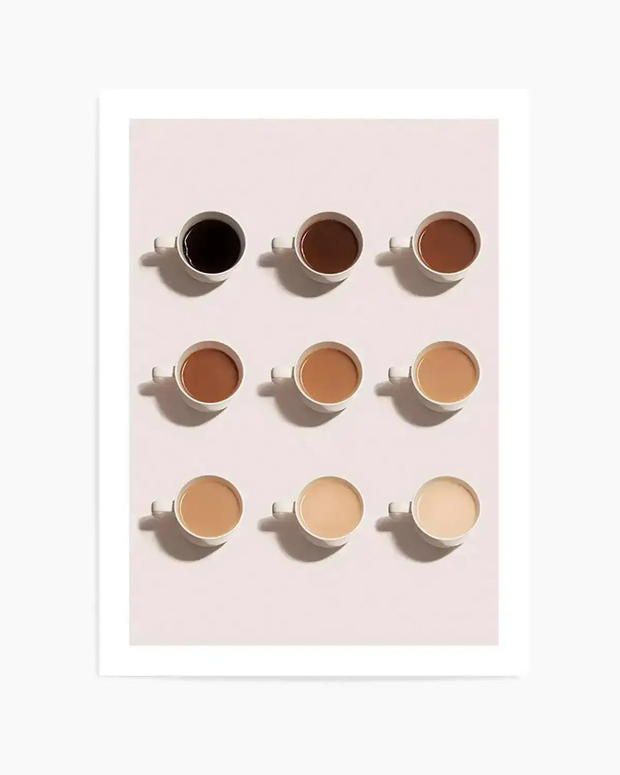 Photography art print featuring nine white ceramic mugs arranged in a 3x3 grid on a light pink background, each filled with coffee of varying shades from dark black to very light cream, creating a gradient effect.