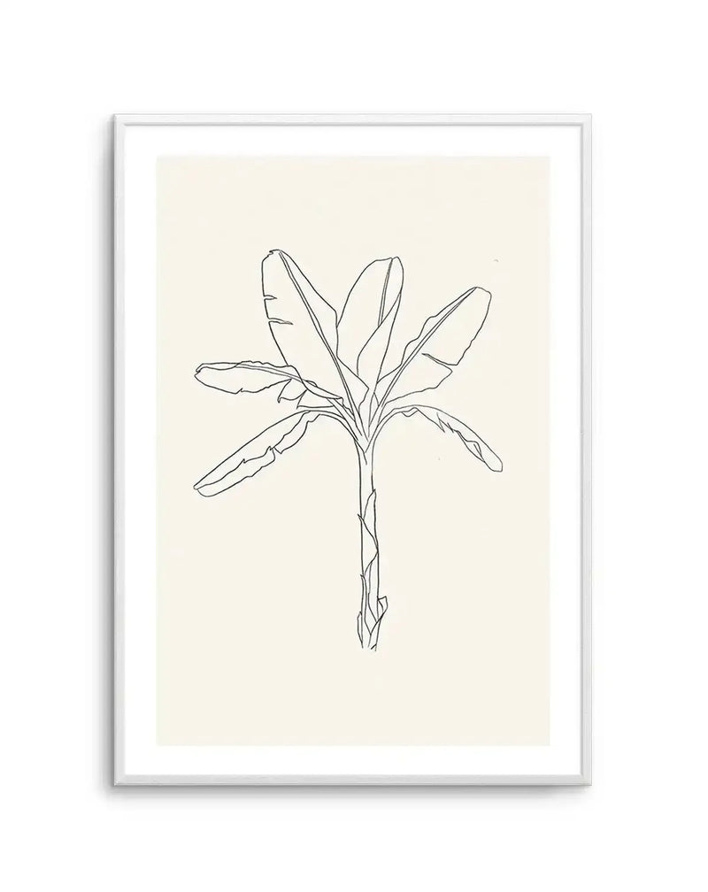 Sketched art print featuring a minimalist line drawing of a banana palm tree with large, broad leaves and a textured trunk, in black ink on a cream background, displayed in a white frame with white border.