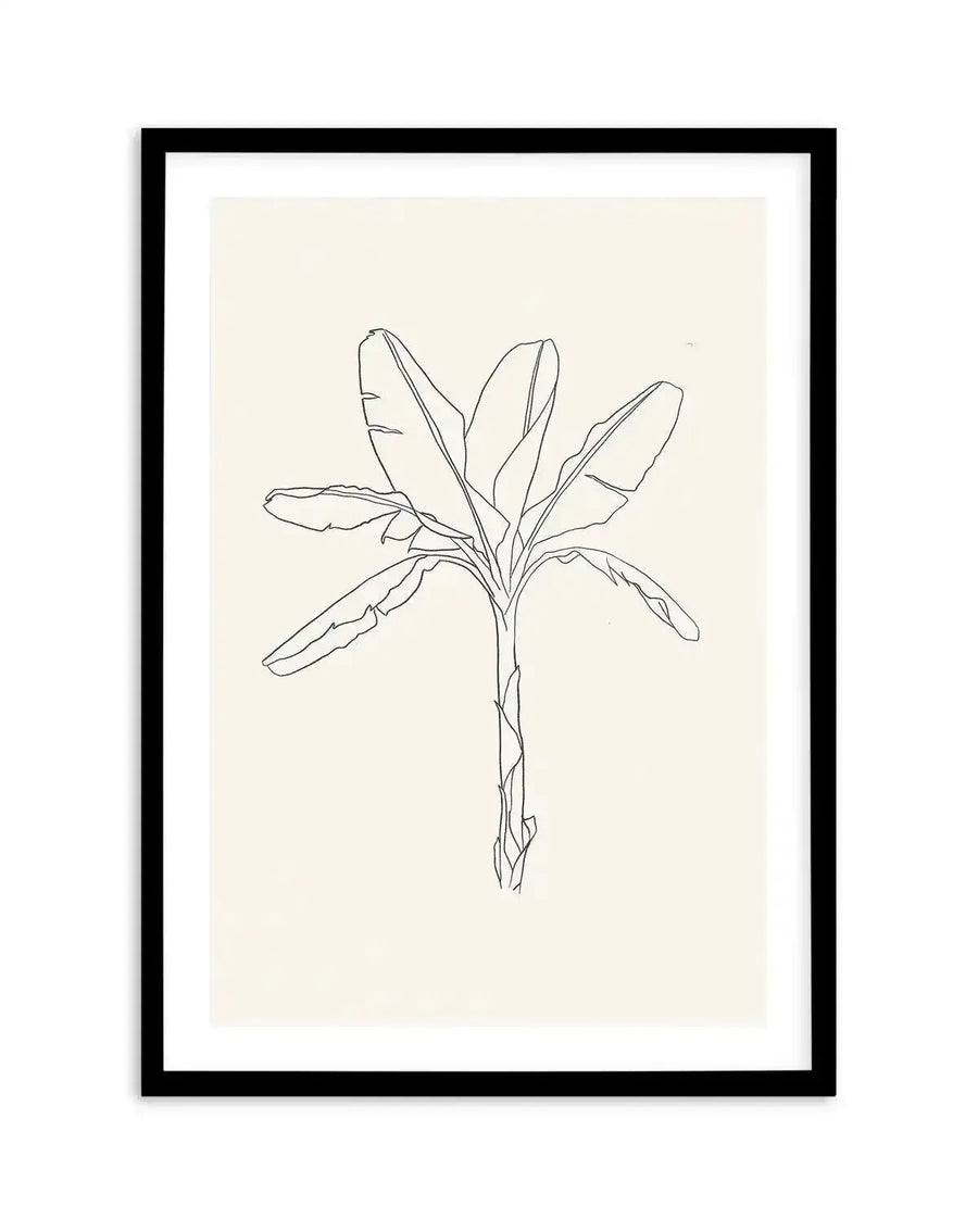 Sketched art print featuring a minimalist line drawing of a banana palm tree with large, broad leaves and a textured trunk, in black ink on a cream background, displayed in a black frame with white border.