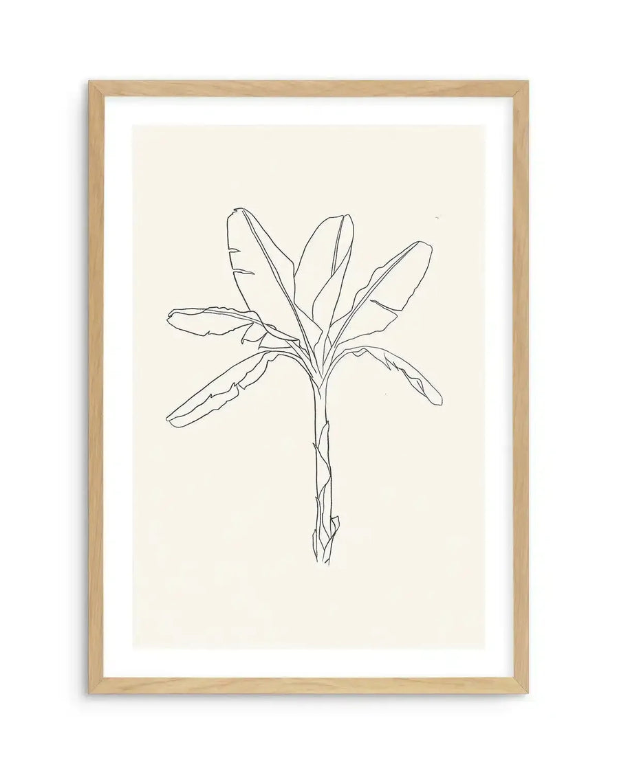 Line art print featuring a minimalist illustration of a palm tree with large, fanned leaves and a textured trunk, drawn in black on a cream background, printed on fine art paper and displayed in a natural oak frame with white border.