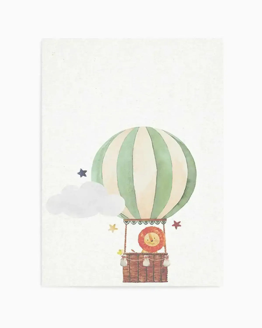 Watercolour art print featuring a hot air balloon with vertical sage green and cream stripes, carrying a cute lion cub in a brown wicker basket. The composition includes a white cloud and scattered stars in blue, yellow, and red on a textured cream background.