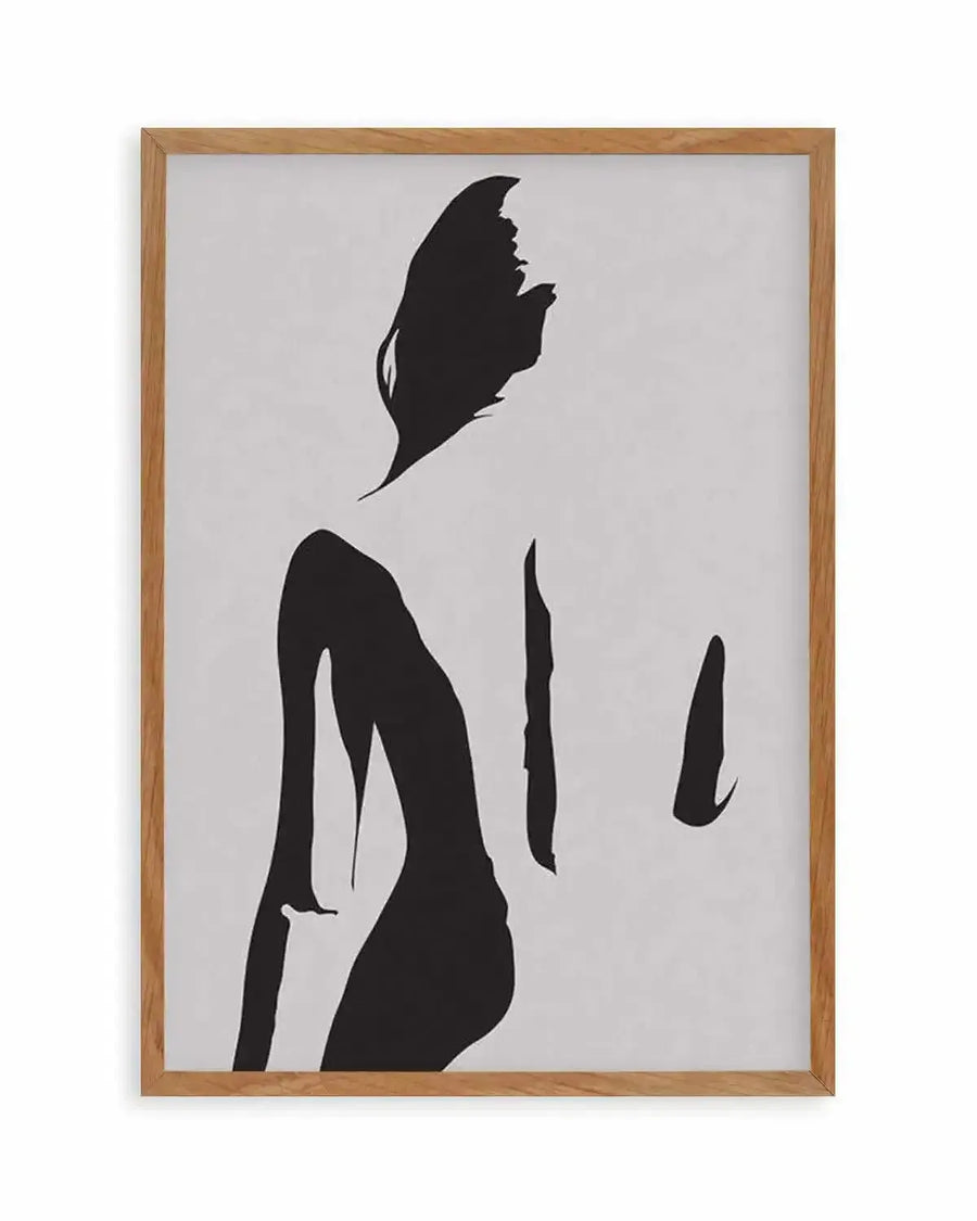 Abstract art print featuring a minimalist black silhouette of a female torso from the back, with flowing hair and subtle curves, on a light grey background, displayed in a natural oak frame with white border.