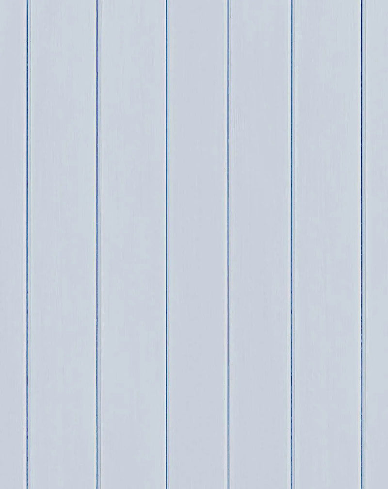 Tongue and groove wood panel wallpaper featuring evenly spaced vertical planks in ice blue and pale gray tones. The panels have a subtle wood grain texture and are separated by darker blue grooves running the full height of the image, creating a clean, linear pattern typical of beadboard or shiplap styling.