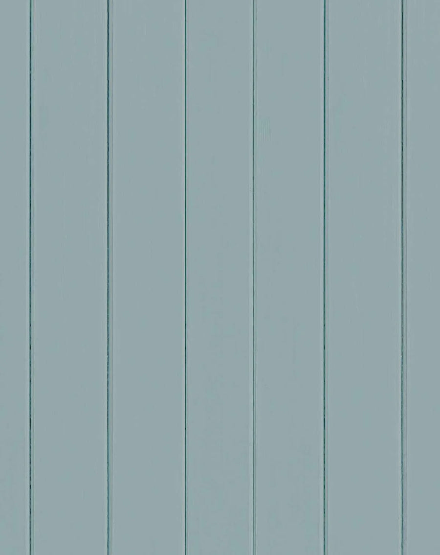 Tongue and groove wood panel wallpaper in soft sage green with vertical wooden slats separated by darker green-grey grooves. The panels have a matte finish with subtle wood grain texture visible throughout. Six evenly-spaced vertical boards extend from top to bottom of the composition, creating a clean, linear pattern. The overall color palette is muted and calming, ranging from pale celadon to soft grey-green tones.