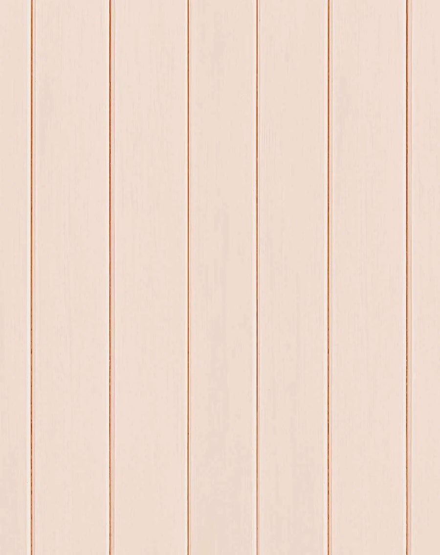 Tongue and groove wood panel wallpaper with vertical planks in a soft, slightly peachy beige tone. The design features realistic wood grain texture and narrow grooves separating each plank, creating a traditional shiplap or paneling effect. The overall appearance is warm and neutral with a matte, natural wood finish.