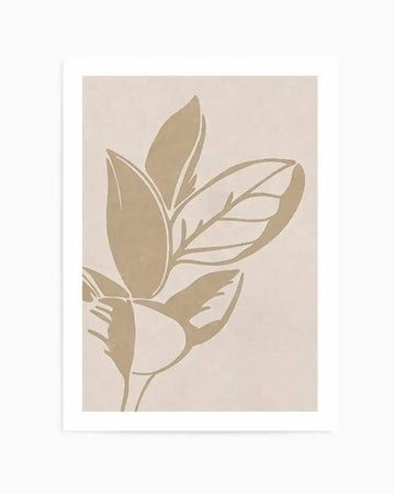 Art print featuring an illustration of a tropical plant with large, broad leaves in a solid, muted beige color against a lighter, warm cream background. The design has a minimalist, graphic quality with clean lines and a matte finish, displayed in a white frame with a white border.