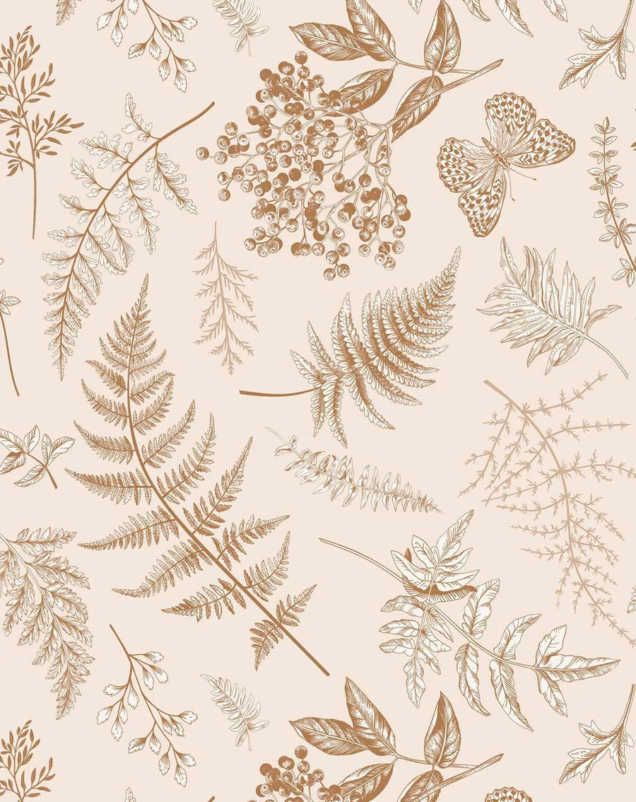 Peel and stick wallpaper featuring a repeating pattern of vintage botanical illustrations in shades of warm brown and beige on a soft, pale pink background. The design includes various ferns, branches with berries, and a butterfly, all rendered with fine line work and shading, giving a hand-drawn, antique feel.