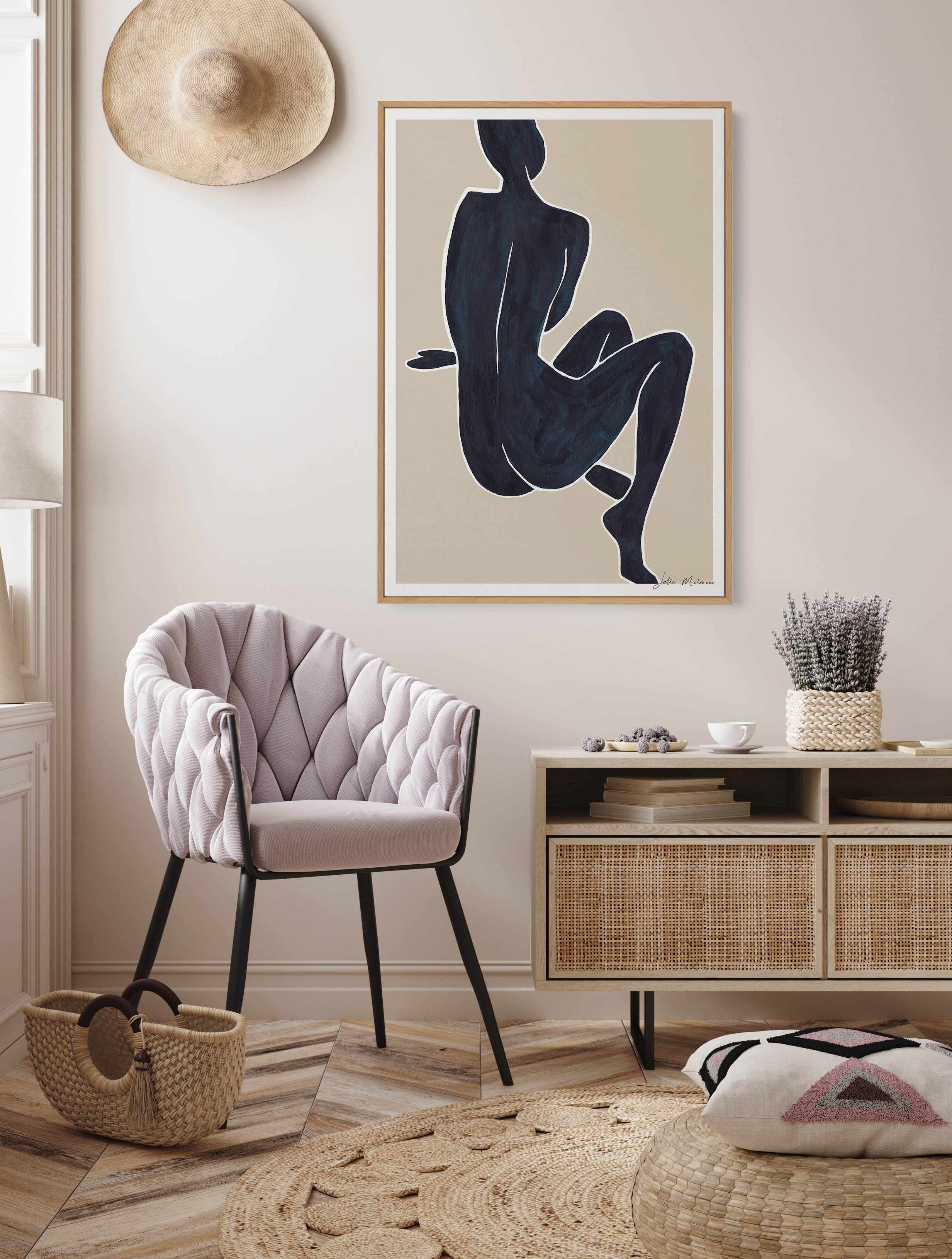 Woman Sitting by Sella Molenaar | Framed Canvas Art Print