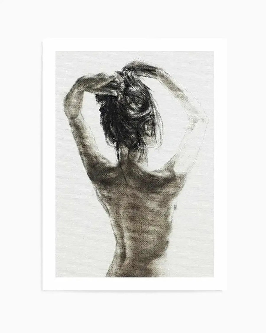 Charcoal art print featuring the back of a woman with her arms raised, hands clasped behind her head, on a white background. The drawing has visible charcoal texture and shading, highlighting the contours of her back and the messy bun of her hair.