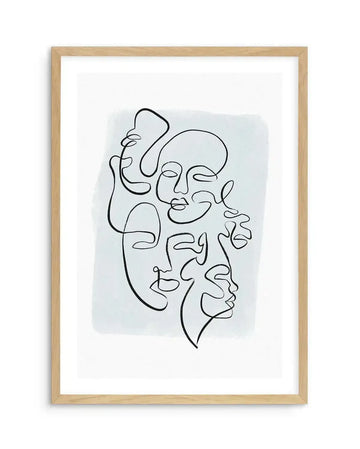 Abstract line drawing of multiple overlapping faces in continuous black ink lines on a soft periwinkle watercolour wash background, mounted in a natural wood frame with white border. The minimalist faces are arranged vertically, each with simplified features including eyes, noses, and lips, creating an interconnected composition that suggests unity and connection.