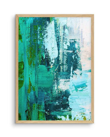 Abstract art print featuring vertical brushstrokes in varying shades of teal, emerald green, and white, creating a textured, layered composition suggestive of a dense forest or flowing water. Printed on fine art paper and displayed in a natural oak frame with a white border.