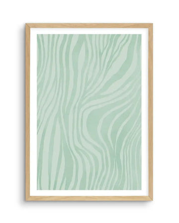 Abstract art print featuring a repeating pattern of organic, wavy lines in a soft, muted sage green against a lighter, pale mint green background, displayed in a natural oak frame with white border.