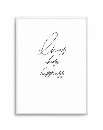 Framed art print featuring handwritten script text reading "always choose happiness" in black ink on a white background. The text is arranged in three lines with an elegant, flowing cursive style. The artwork is displayed in a light gray or silver frame with a white border.
