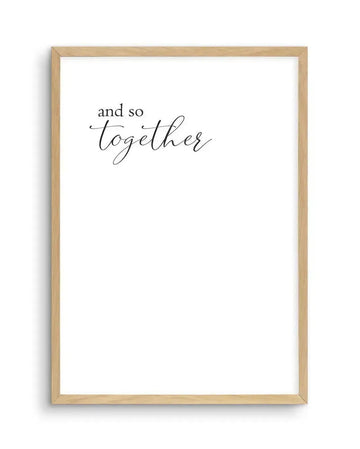 Art print featuring the words "and so" in a simple sans-serif font above the word "together" in a flowing script font, all in black on a white background, displayed in a natural oak frame with white border.