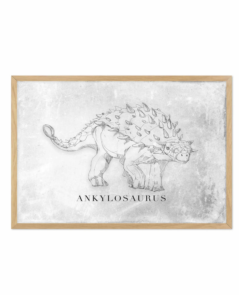 Framed line drawing of an Ankylosaurus dinosaur on a weathered white background. The sketch shows the armored quadruped in profile, featuring distinctive rows of spikes along its back and sides, a club-like tail, and detailed anatomical features rendered in black ink with cross-hatching. The word "ANKYLOSAURUS" appears centered below the illustration in serif typography. The artwork is presented in a natural wood frame with a white border against the distressed, textured background.