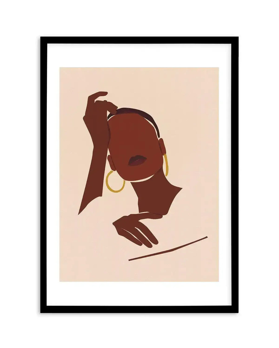Art print featuring an abstract illustration of a woman with dark brown skin and short hair, wearing large gold hoop earrings. Her right hand is raised to her head, and her left hand rests gently below her chest, with a single dark brown line suggesting a collarbone. The background is a soft, warm cream colour. The print is displayed in a black frame with a white border.