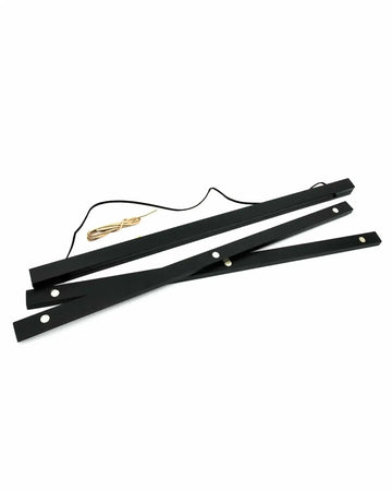Black poster hanger kit displayed on white background, featuring three flat black wooden strips with silver metal grommets and a gold teardrop-shaped finial attachment. The strips are arranged fanned out to show the adjustable hanging system used for suspending art prints and posters.