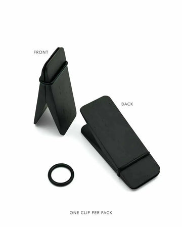 Art Print (abstract):
"Abstract art print featuring two black, rectangular, textured clips with a black rubber band. One clip is folded into a triangular shape, labeled 'FRONT', and the other is flat, labeled 'BACK'. A separate black rubber band is also visible. The text 'ONE CLIP PER PACK' is at the bottom."