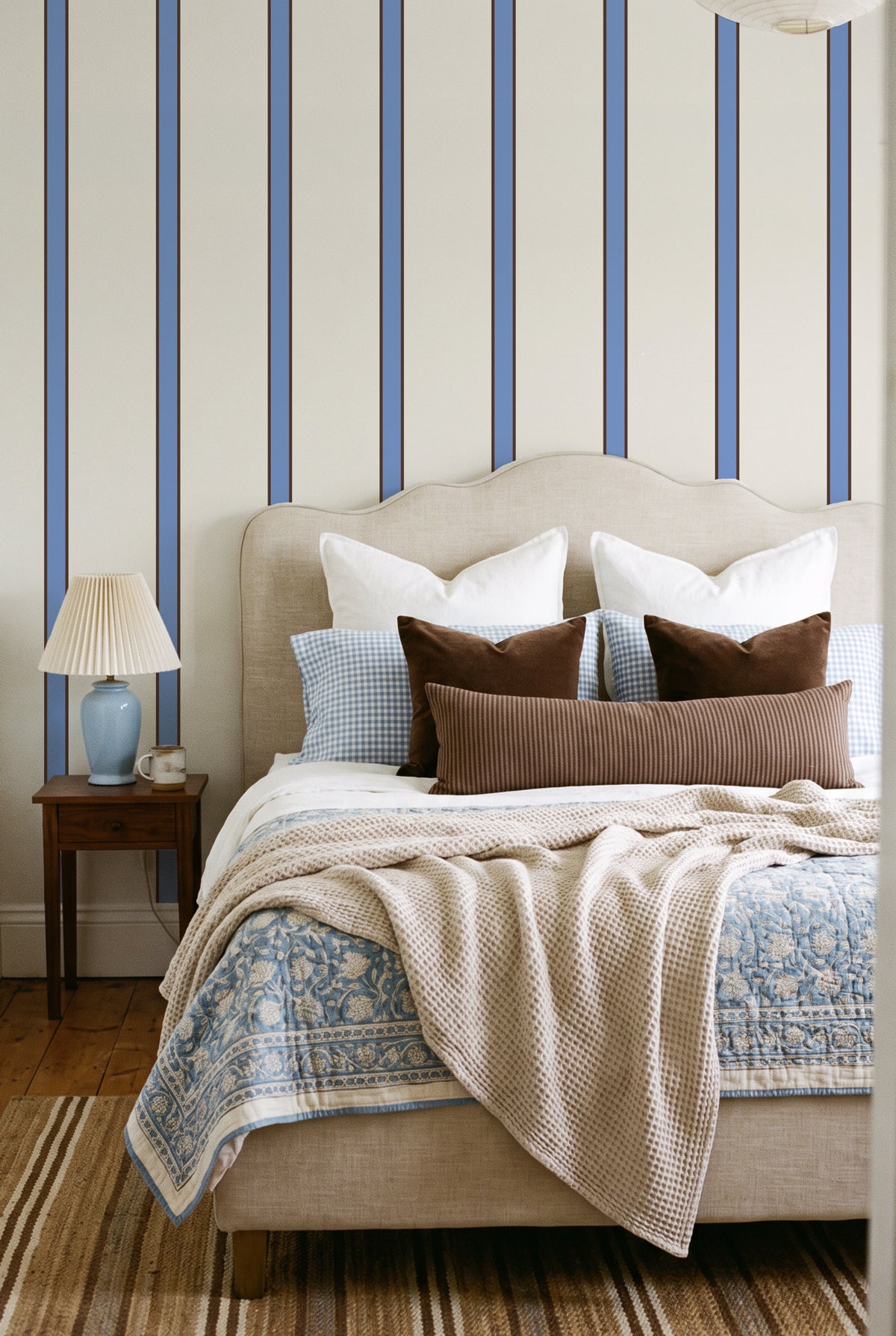 Cornflower Blue and Brown Cabana Stripe wallpaper in a calm bedroom