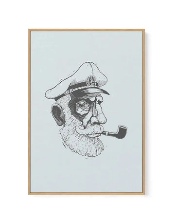 Framed canvas art print featuring a black ink illustration of a bearded sea captain in profile facing right. The captain wears a wide-brimmed naval hat with insignia and smokes a curved pipe. His face shows detailed line work with prominent nose, full beard, and weathered features. The background is a soft pale blue-green. The artwork is displayed in a natural wood frame with a white border, mounted on a light neutral wall.