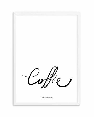 Framed art print featuring the word "Coffee" written in an elegant, flowing black script font against a white background. The print is displayed in a white frame with a subtle 3D perspective effect showing the frame's depth. Small text reading "OLIVE ET ORIEL" appears at the bottom center of the print. The minimalist composition uses only black text on white, creating a clean, contemporary aesthetic suitable for kitchen or café decor.