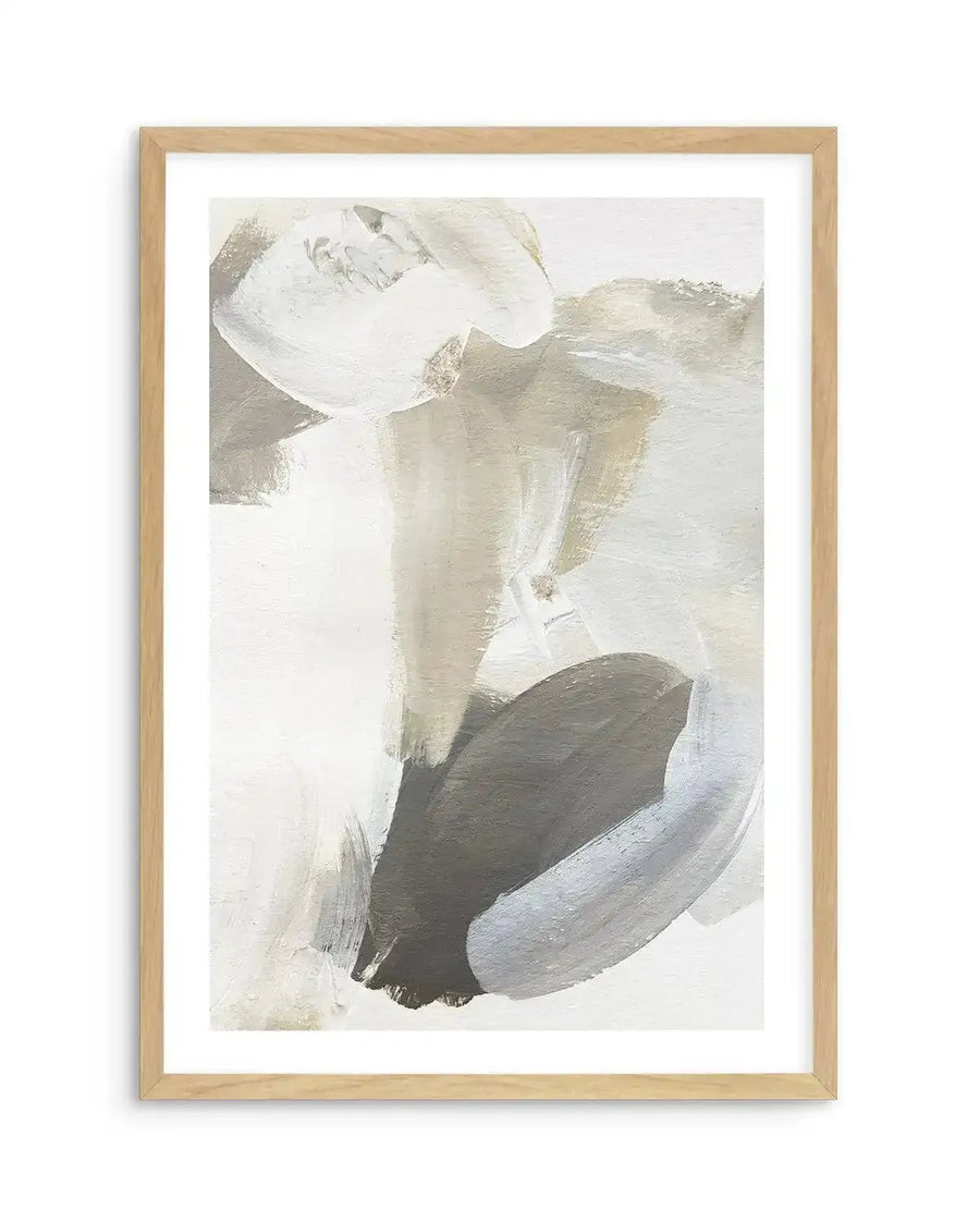Abstract art print featuring broad, sweeping brushstrokes in shades of warm white, light beige, dark grey, and soft blue-grey, creating a dynamic and layered composition. Printed on fine art paper and displayed in a natural oak frame with white border.