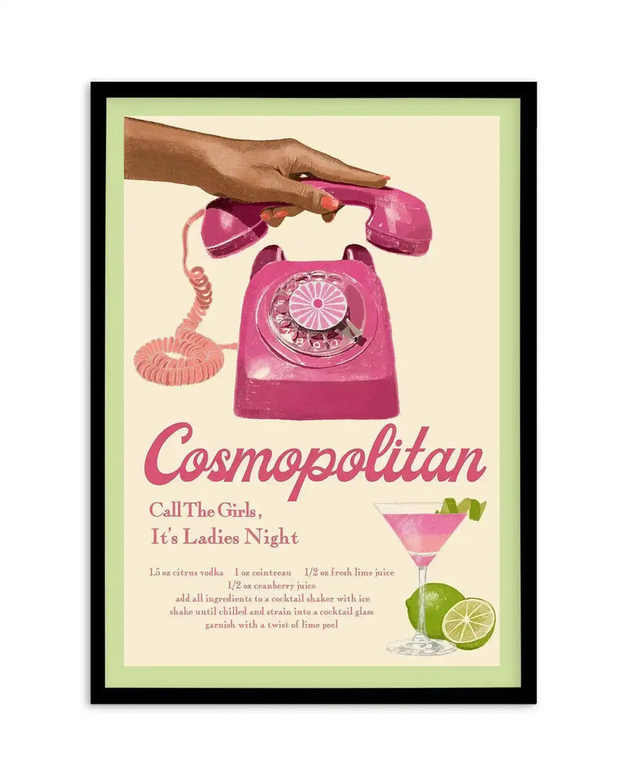 Art print featuring a retro-style illustration of a woman's hand holding a pink rotary telephone receiver, with the word "Cosmopolitan" in a large, elegant script below. The print also includes the text "Call The Girls, It's Ladies Night" and a recipe for a Cosmopolitan cocktail, accompanied by an illustration of the drink in a martini glass with limes. The artwork has a vintage, slightly textured feel, with a pale yellow background and a light green border.