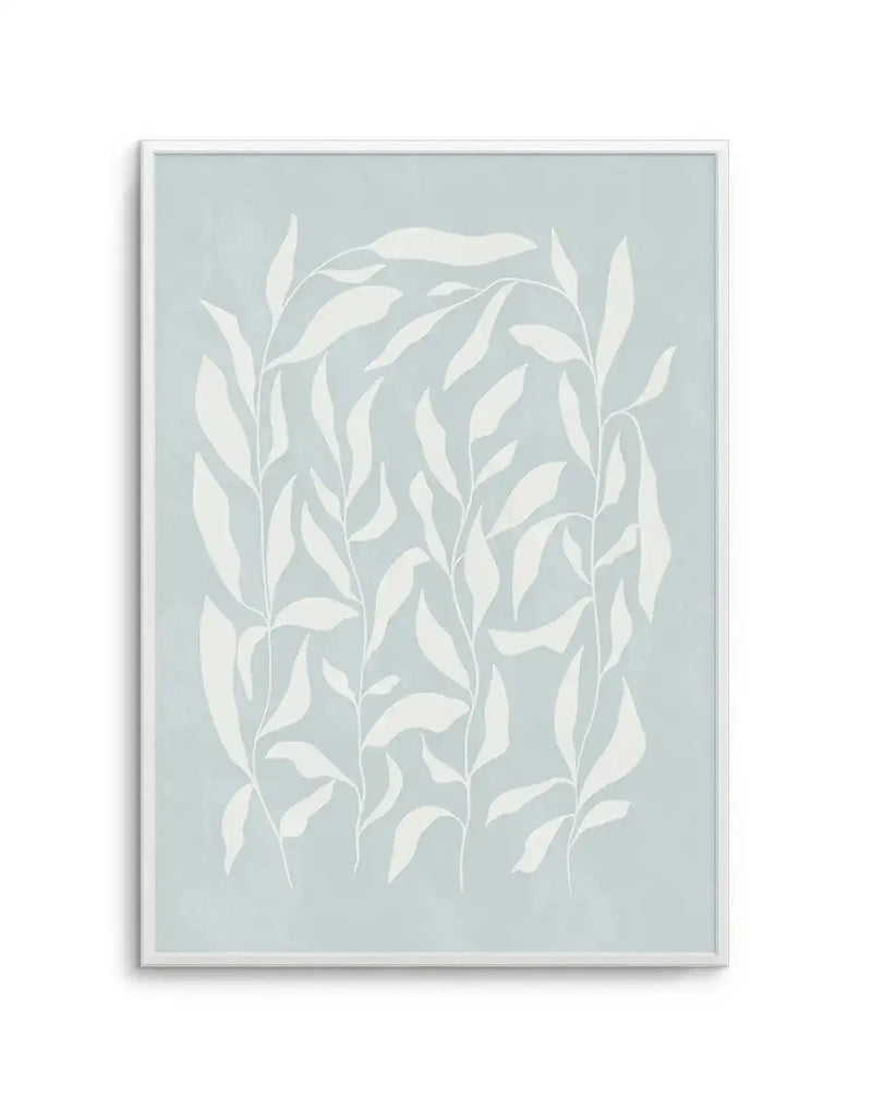 Art print featuring an illustration of delicate botanical stems with elongated leaves in a soft off-white against a muted pastel blue background, displayed in a white frame with white border.