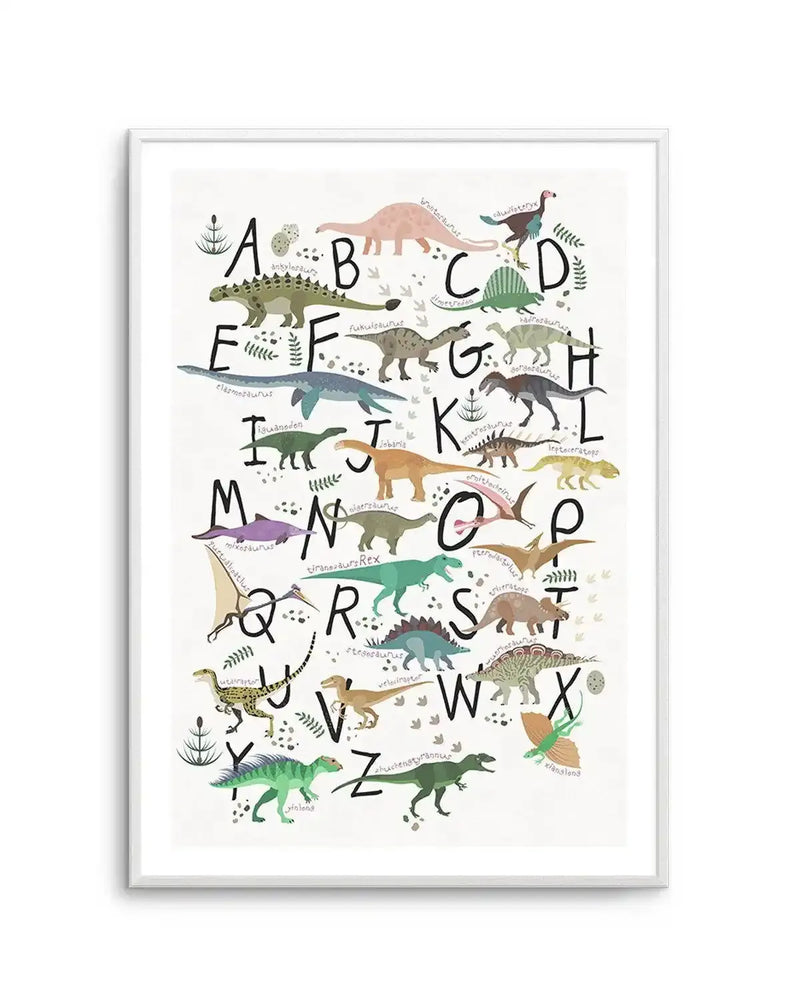 "Children's art print featuring a dinosaur alphabet with each letter represented by a different dinosaur, illustrated in a playful cartoon style with muted earthy tones on a white background, displayed in a white frame with white border. The dinosaurs include a pink Brontosaurus for 'B', a green Ankylosaurus for 'A', and a brown Tyrannosaurus Rex for 'T'."
