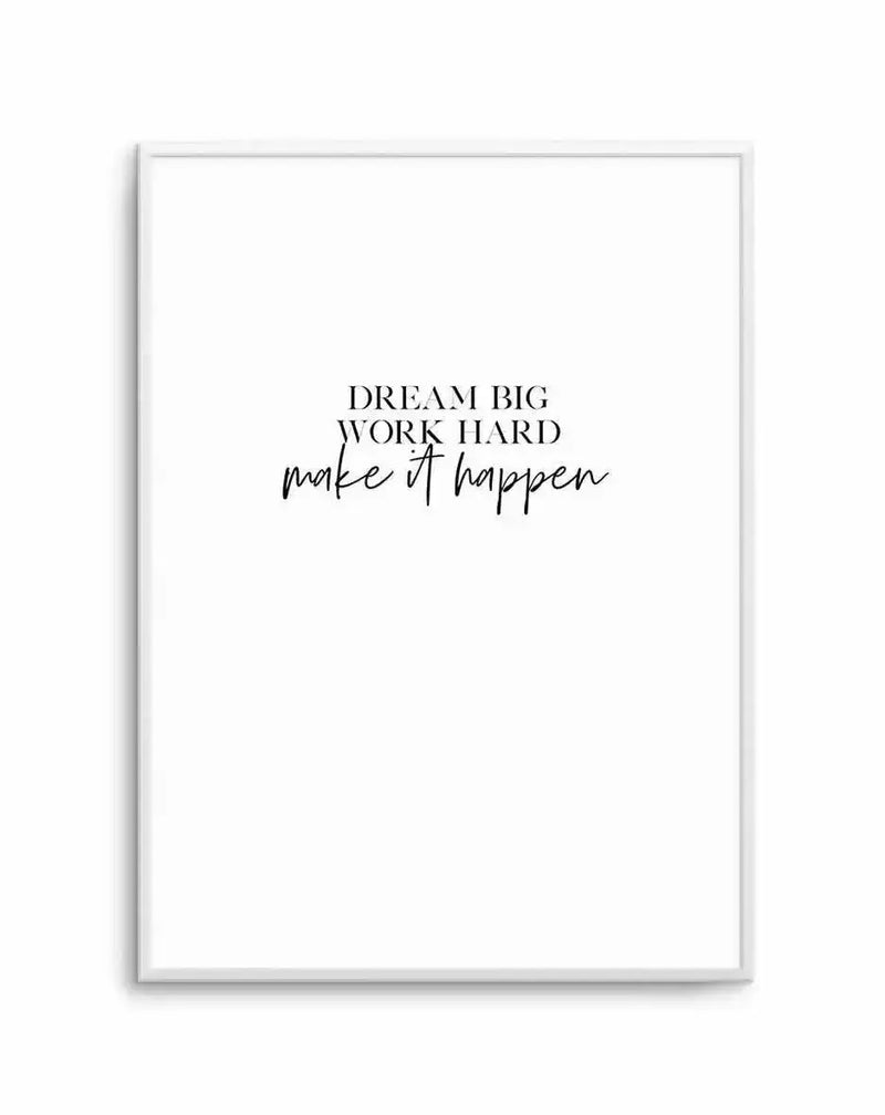 Art print in silver frame featuring minimalist typography on white background. Text reads "DREAM BIG WORK HARD" in spaced capital letters, with "make it happen" written below in flowing script font. Clean, contemporary design with black text centered on the page, suggesting motivational wall art for home or office decor.