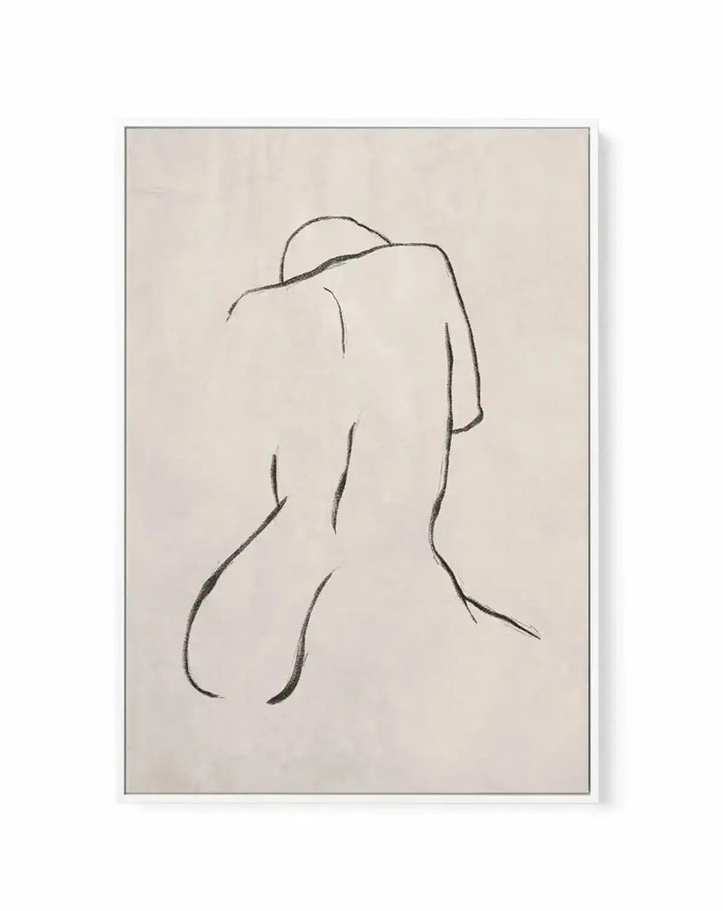 Framed canvas art print featuring a minimalist line drawing of a female figure viewed from behind in a seated or crouched position. The figure is rendered with simple, continuous black ink lines on a cream-colored canvas, showing the curves of the back, shoulders, and legs. The artwork has a sketch-like quality with an understated, contemplative mood. The canvas is mounted in a simple gray frame with a white border.