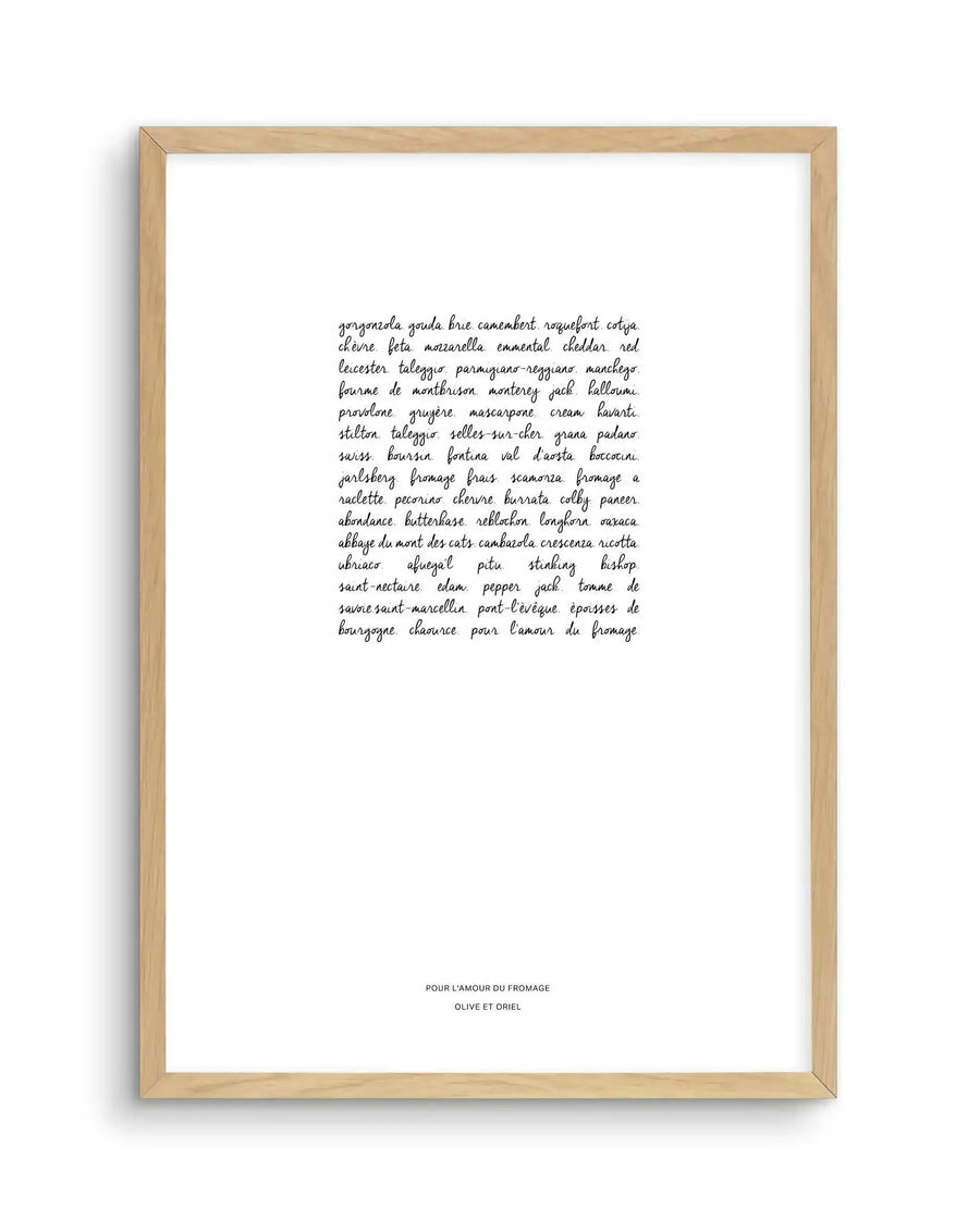 Art print featuring a handwritten list of various cheese names in black script on a white background, printed on fine art paper and displayed in a natural oak frame with white border.