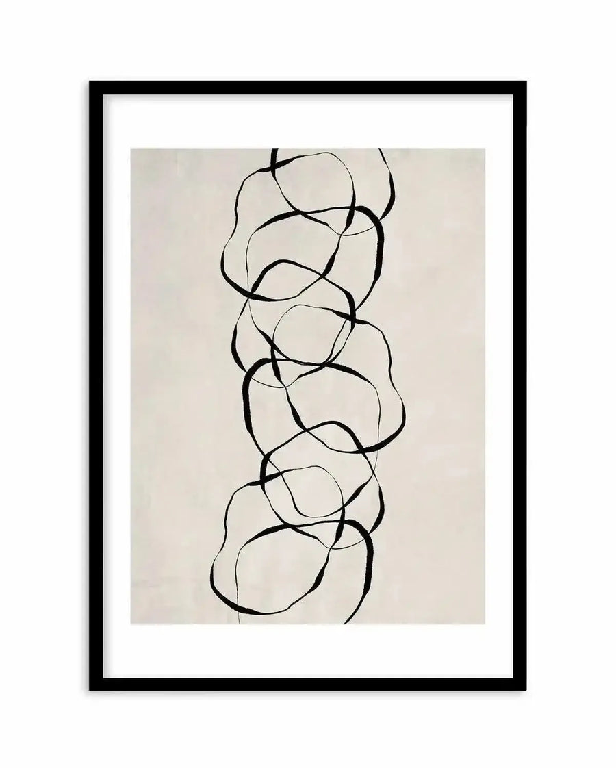 Framed art print featuring abstract black line drawings on a cream background. The composition shows a vertical arrangement of seven organic, rounded shapes connected by flowing curved black lines, creating an interconnected chain-like design. The shapes have soft, irregular edges rendered in light gray or taupe tones, while bold black lines weave through and around them. The artwork is displayed in a black frame with a white border.